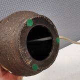 Small beautiful ceramic table lamp in earth colors.