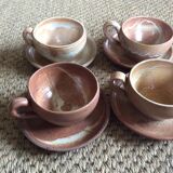 Series of 4 stoneware coffee cups