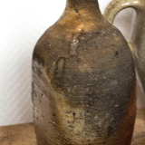 Bouteille en terre cuite ancienne