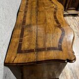 Louis XV period Arbalète chest of drawers in noble wood marquetry