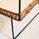 Metal cart with bamboo and wicker details.
