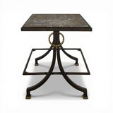 Neoclassical side table in wrought iron and eglomisé glass.