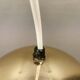 Danish ball lamp from the 80s, in gold colored lacquer.