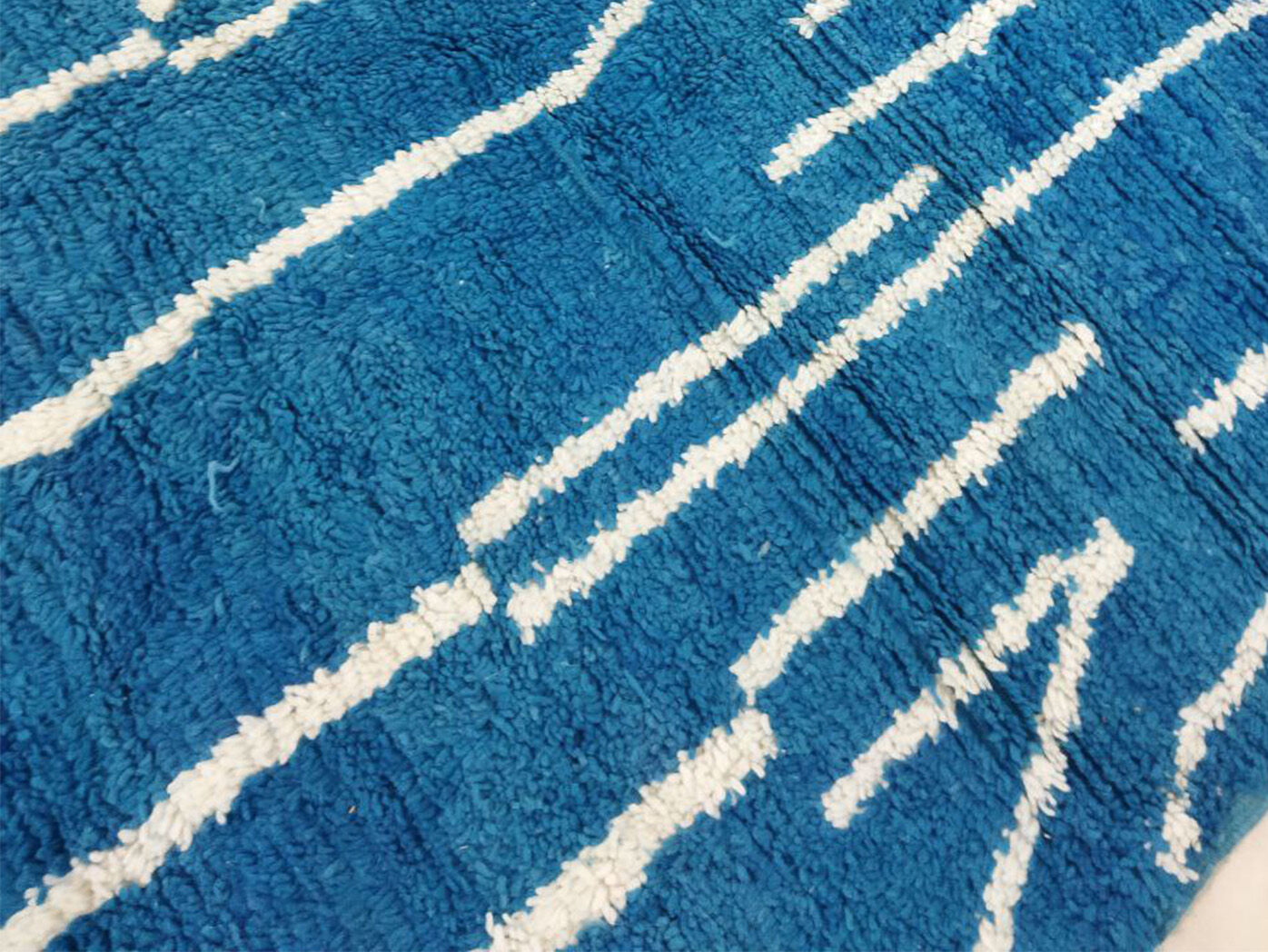 Blue moroccan carpet 300x193cm