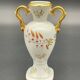 Small amphora vase in Limoges porcelain with gilded handles.
