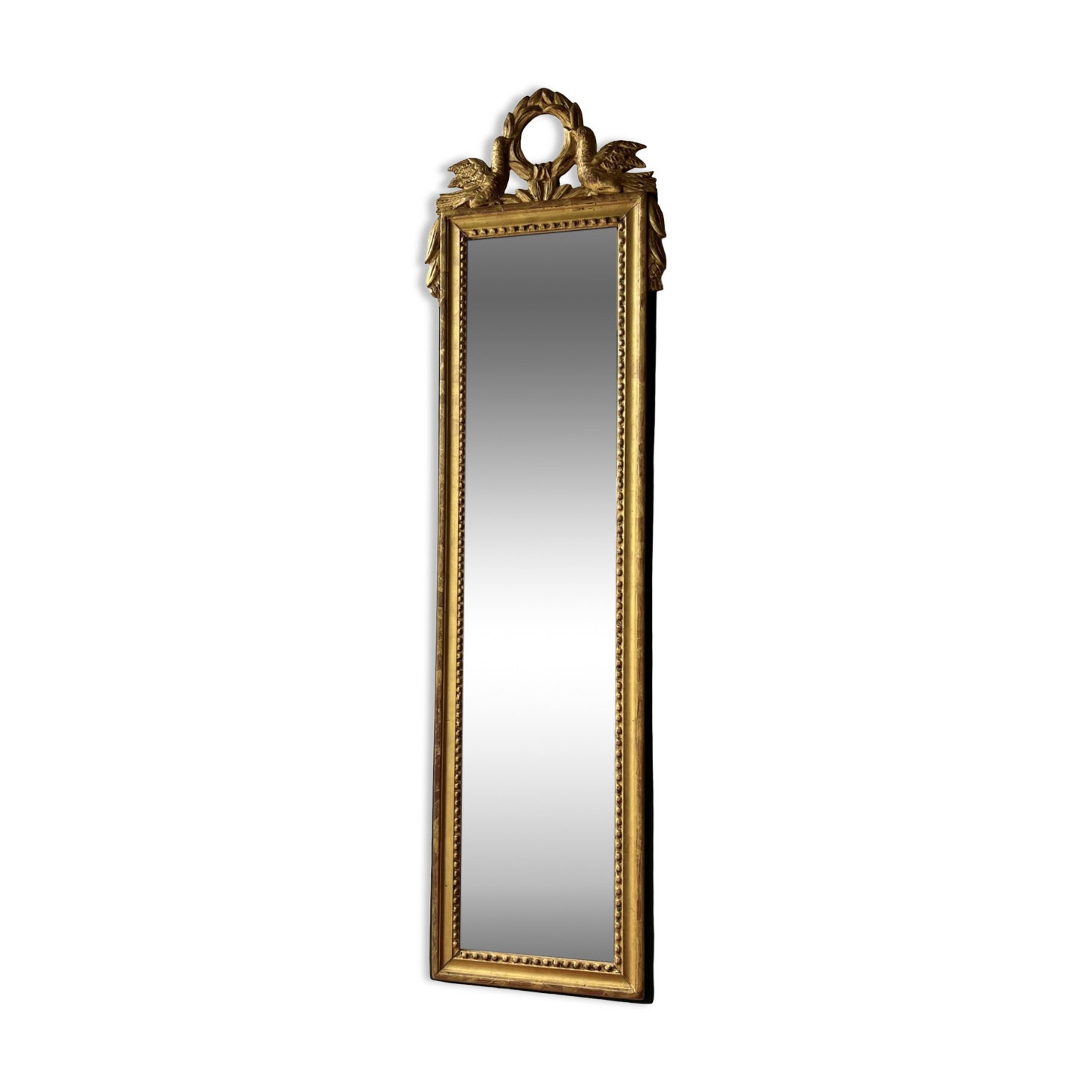 Mirror between two Louis XVI style in gilded wood with leaf around 1900
