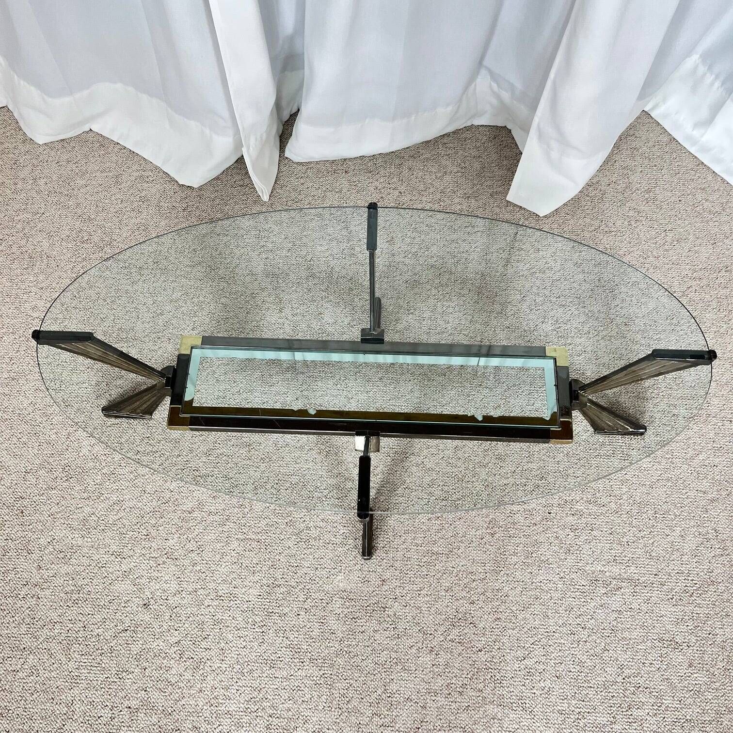 Vintage Italian coffee table in glass, chrome and brass metal, Hollywood Regency style, 1970s.