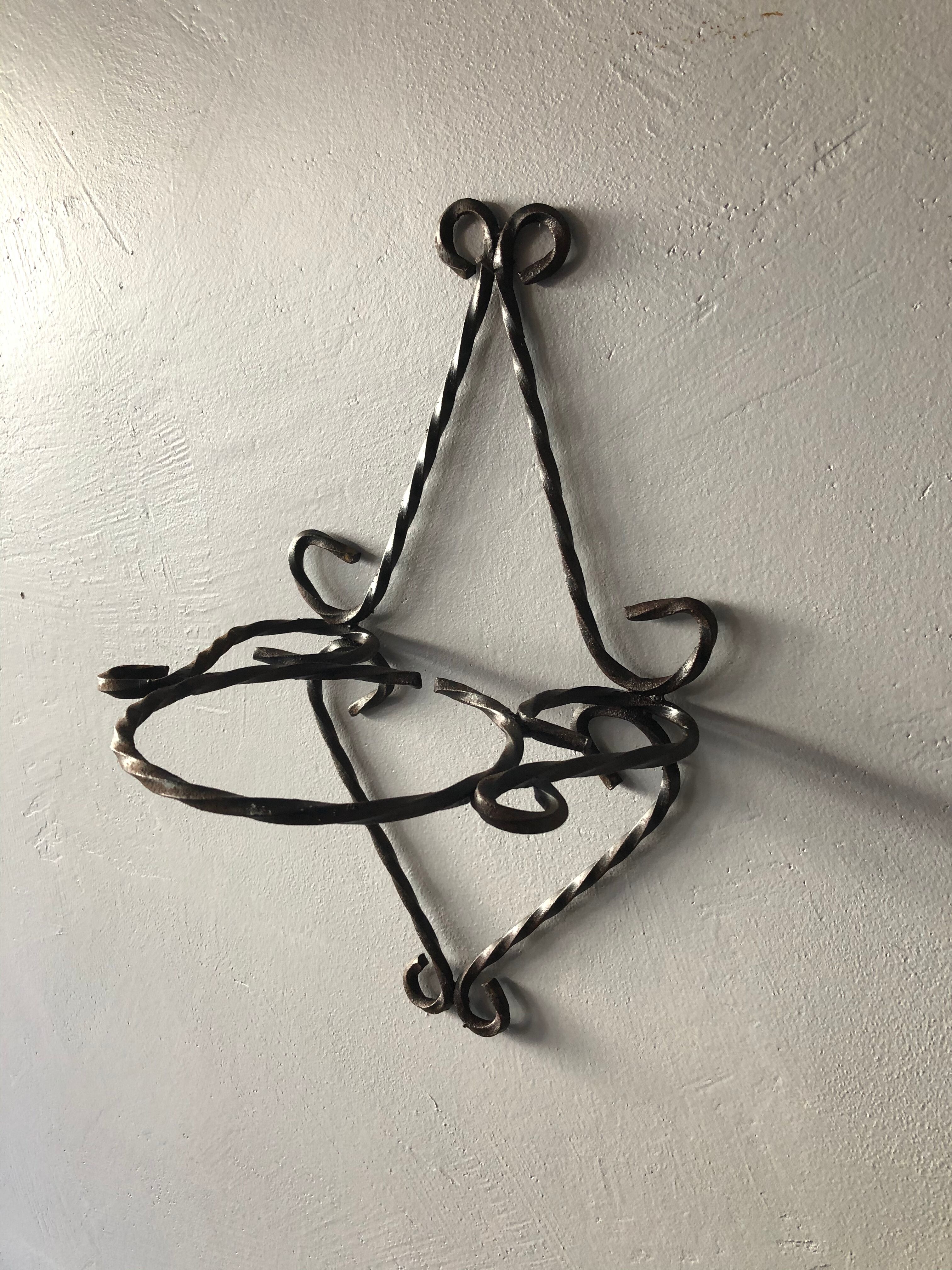 Wrought iron wall plant holder