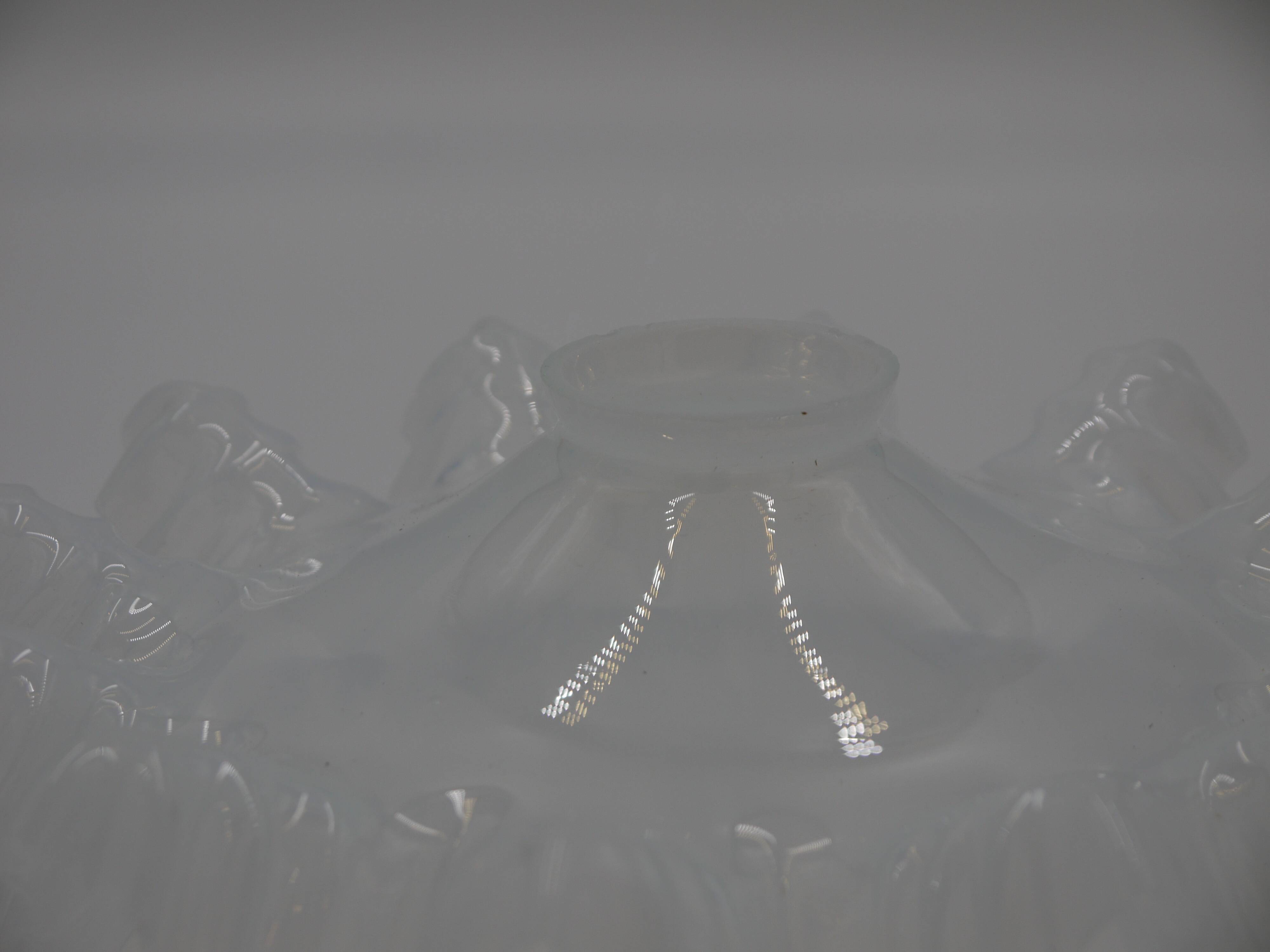 Corrugated glass suspension