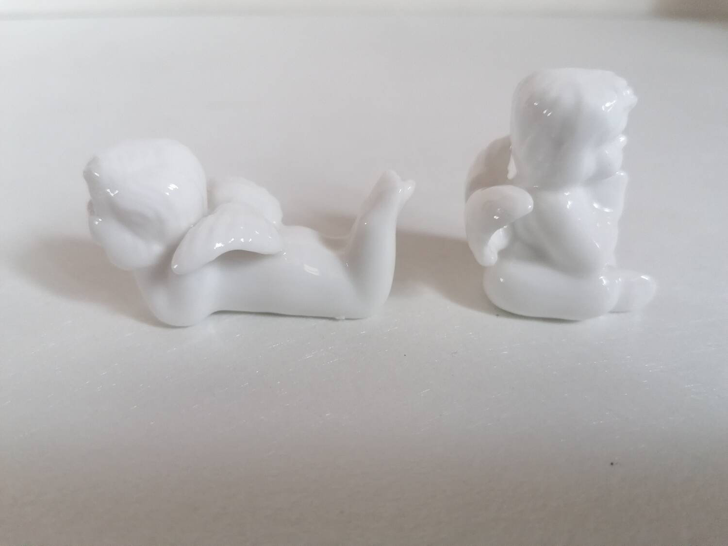 Lot 6 knife holders and 6 porcelain place markers putti angels
