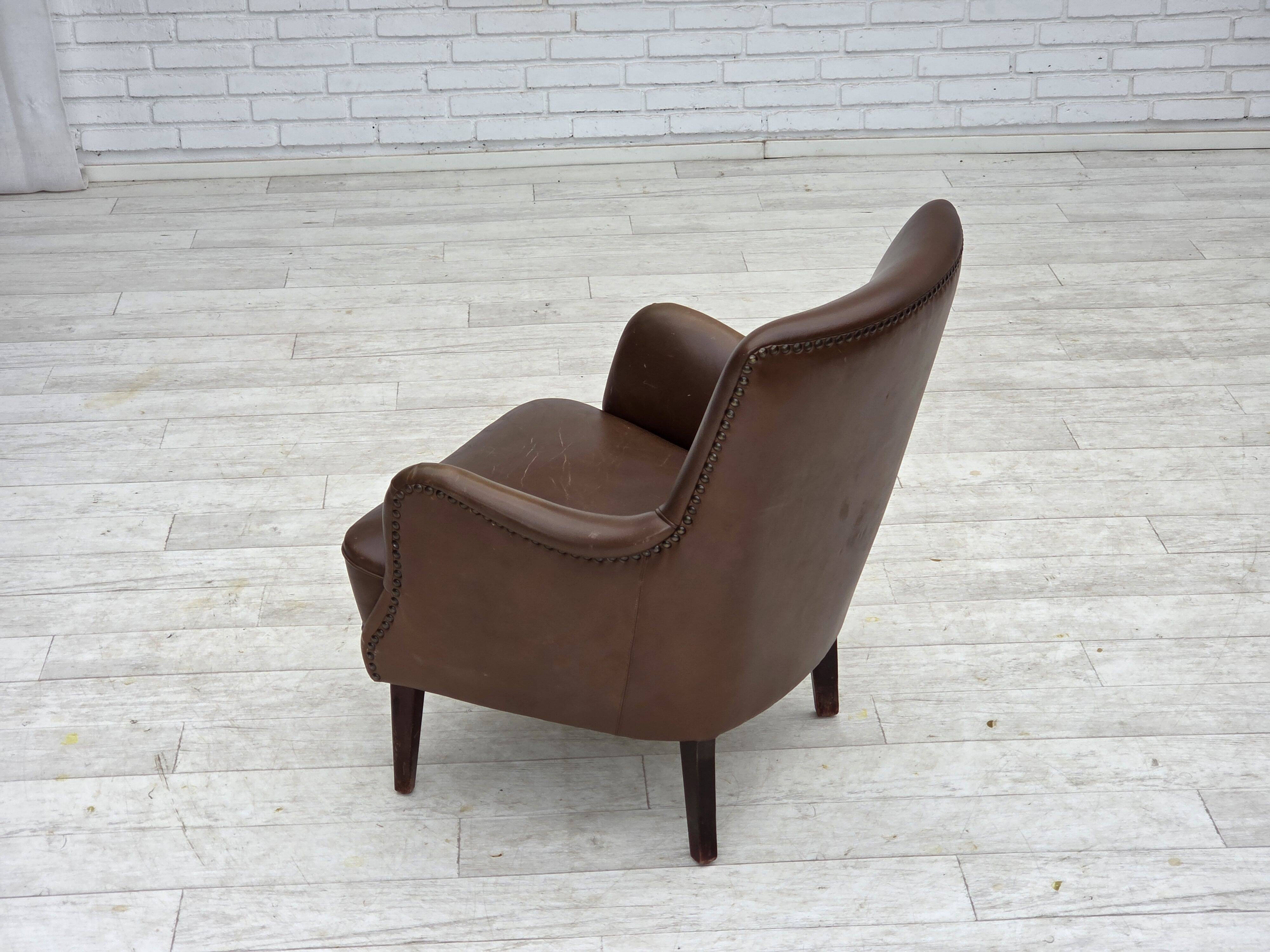 1960s, Danish armchair, furniture leather, ash wood legs.