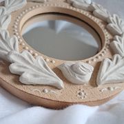 Red and white stoneware mirror, oak leaves