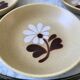 Set of 4 hollow plates in sandstone flowers painted 70s