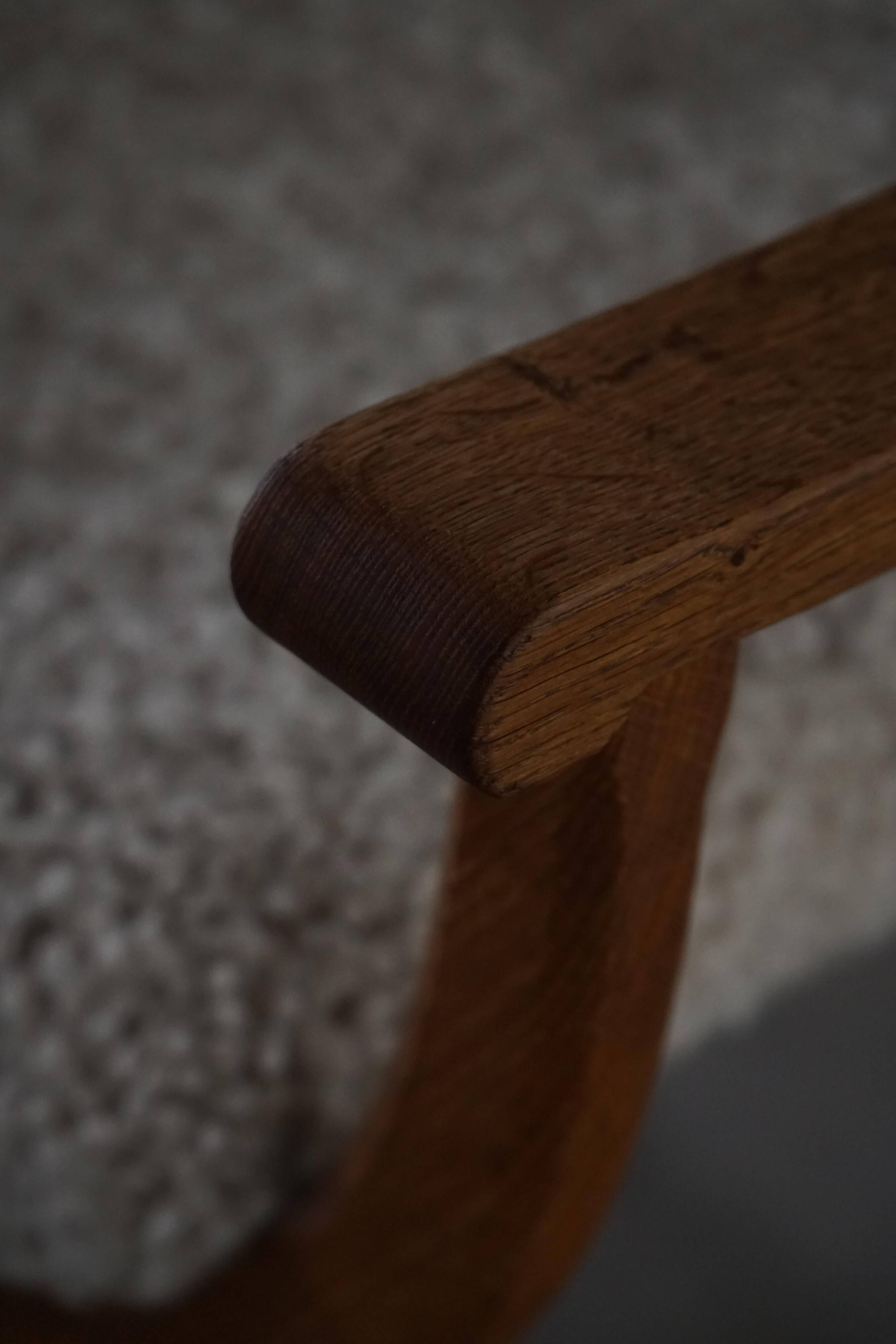 Henning Kjærnulf, Oak and lambswool armchair, "Kurul" model, Mid-century, 1960s