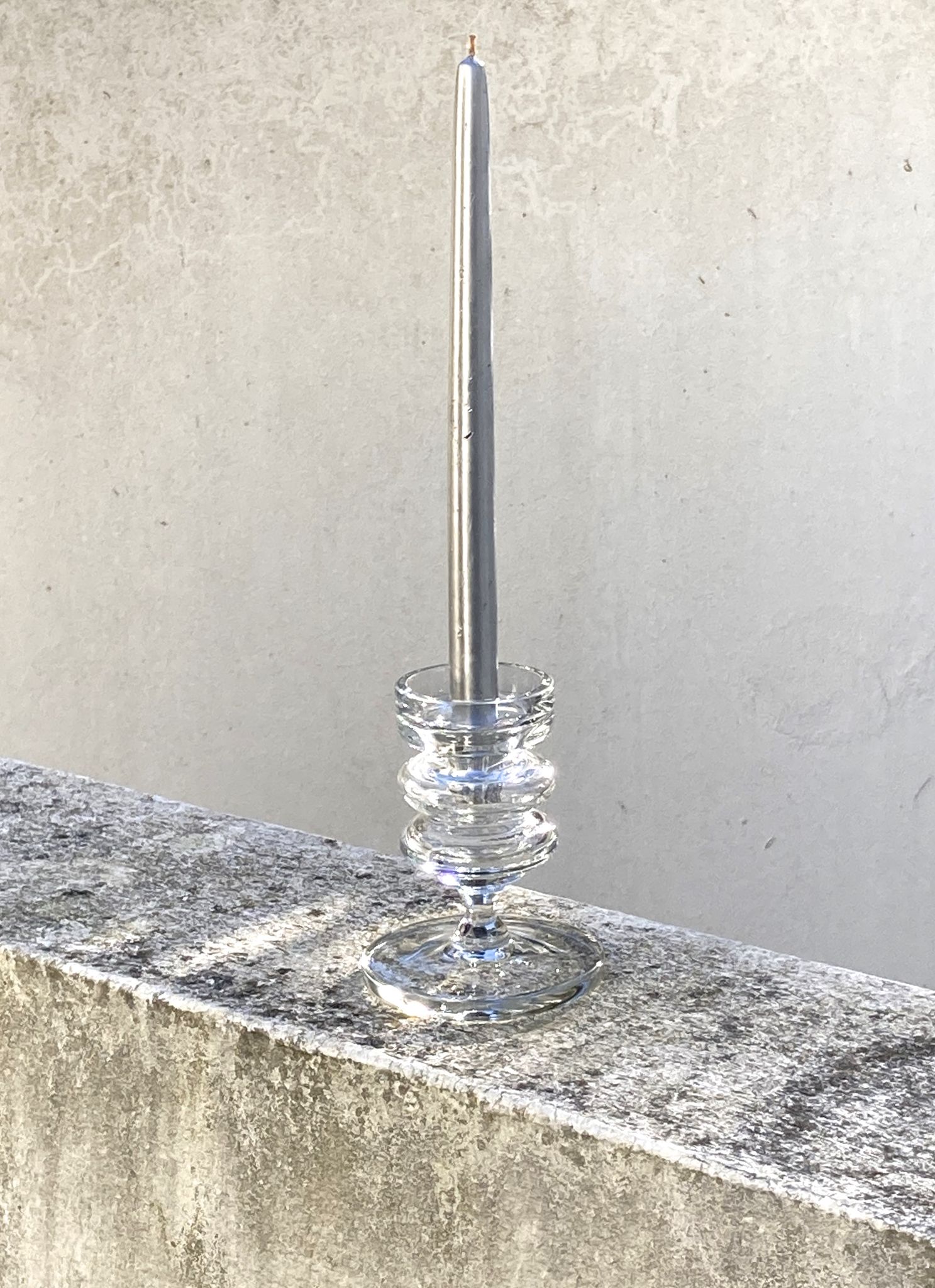 The glass candle holder