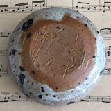 Signed soliflore flower spade in sandstone