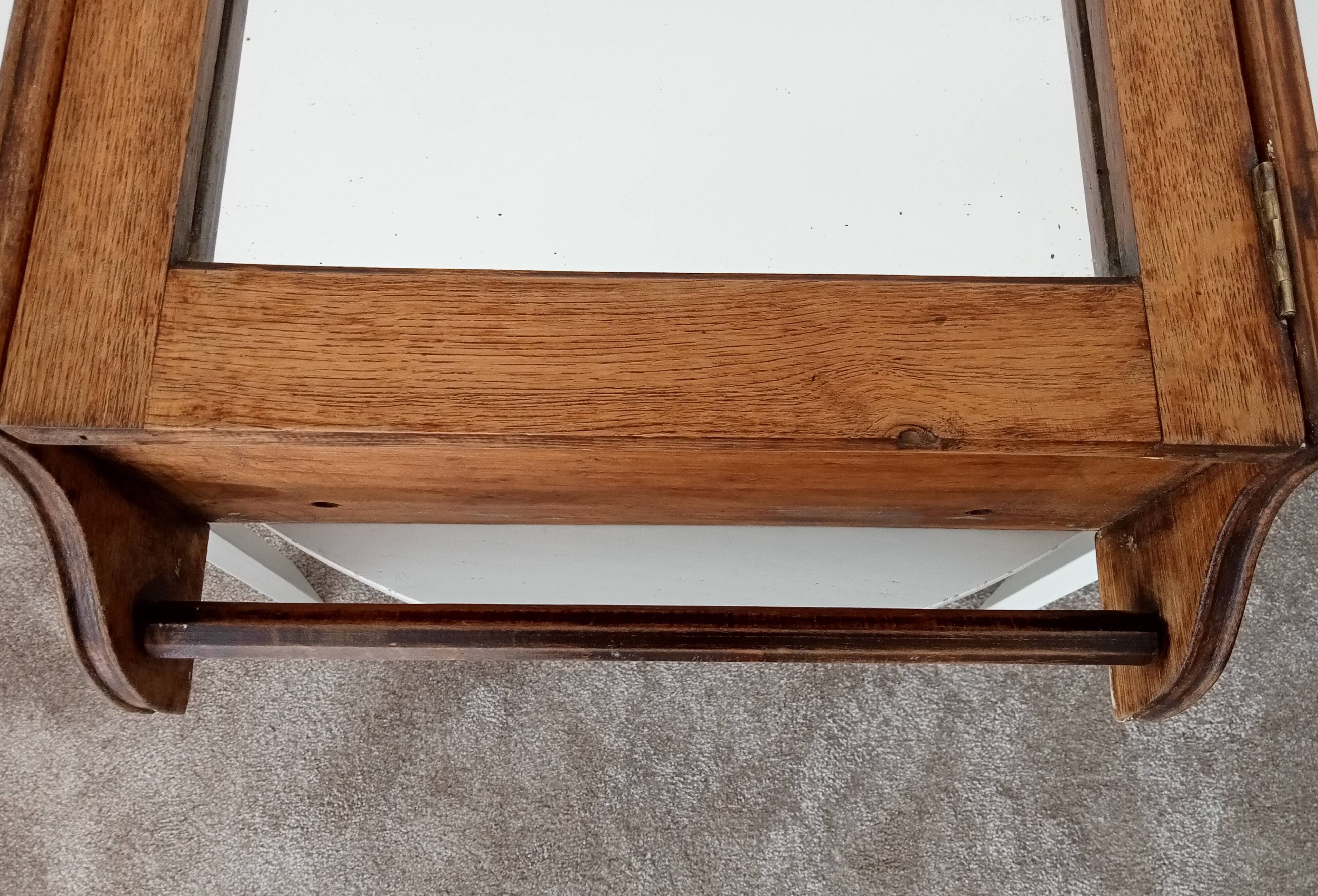 Antique solid oak bathroom cabinet from the early 20th century