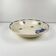 Half-porcelain salad bowl from Badonviller, blue flower pattern, early 20th century.