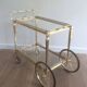 Brass rolling table from the Baguès house.