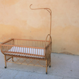 Vintage rattan crib, casters and matte for bed sky