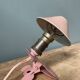 Mushroom lamp with pliers, pink vintage e-reader