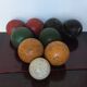 Very old game of wooden petanque balls with piglet