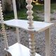 charming curved shelf with 2 turned wooden supports
