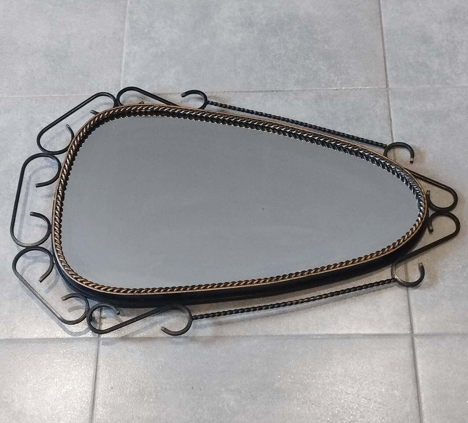 Brutalist antique mirror, sixties era.