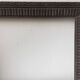 Antique wooden frame with geometric carvings light distress
