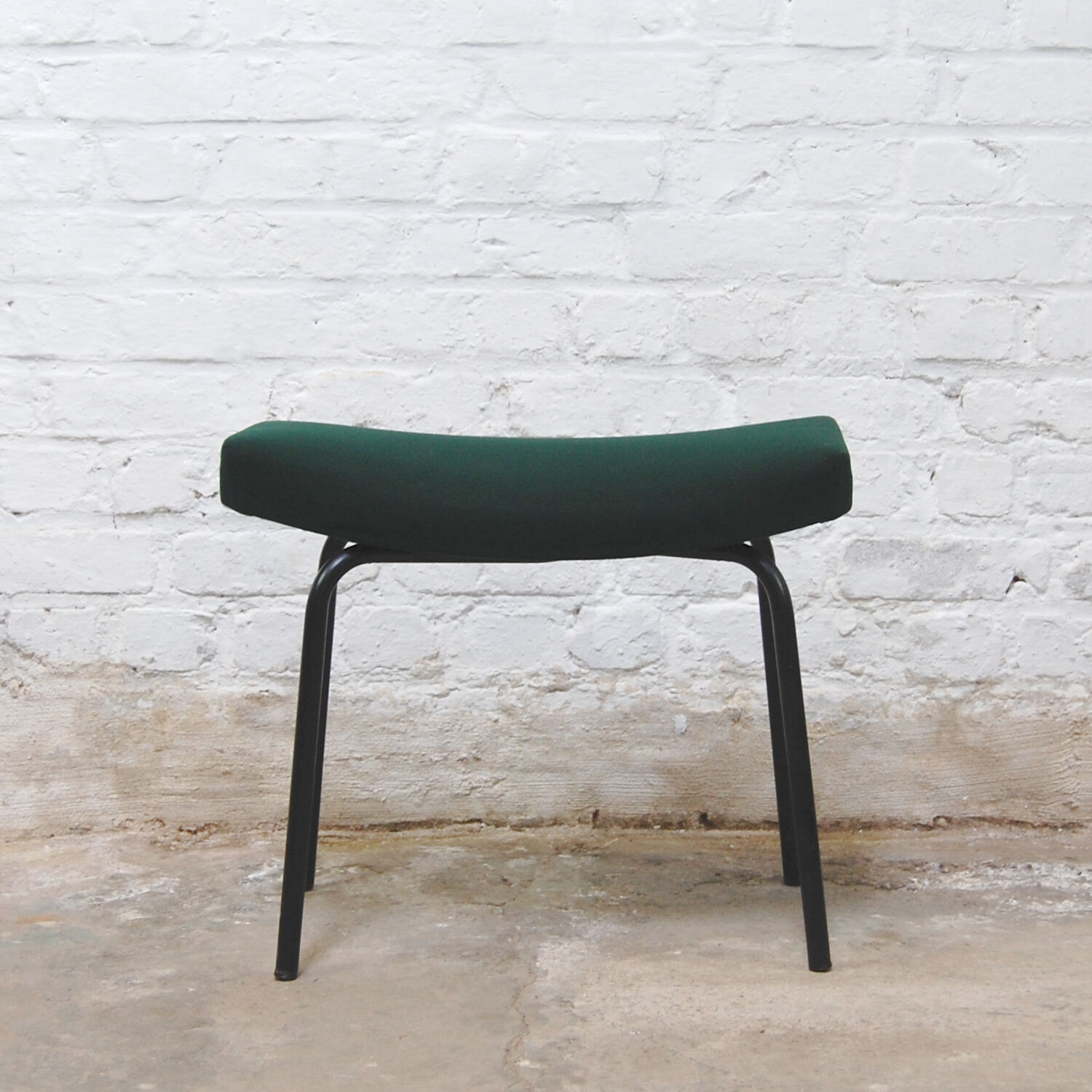 Footrest model "Bull" by Pierre Guariche for Meurop