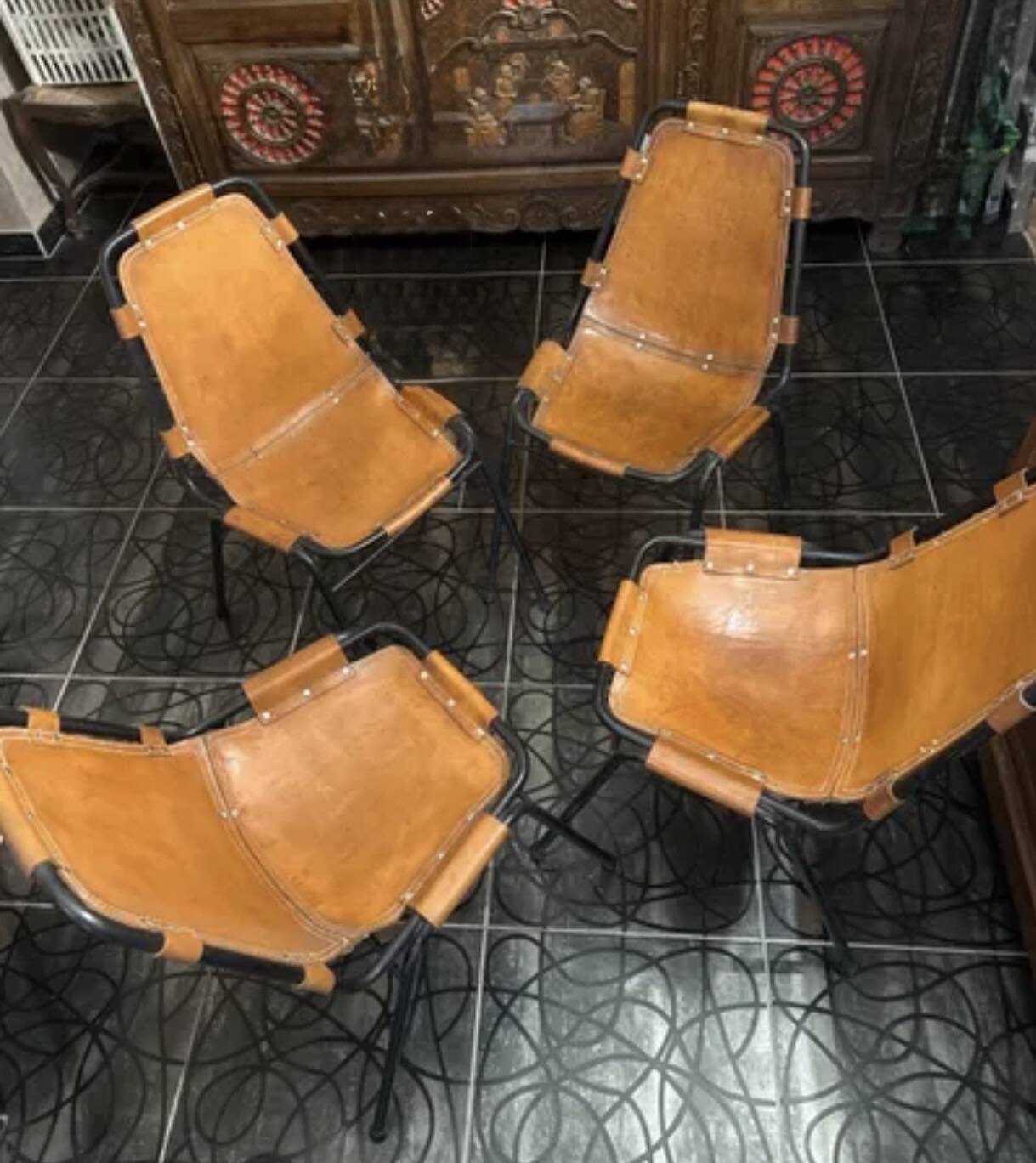 4 chairs by Charlotte Perriand