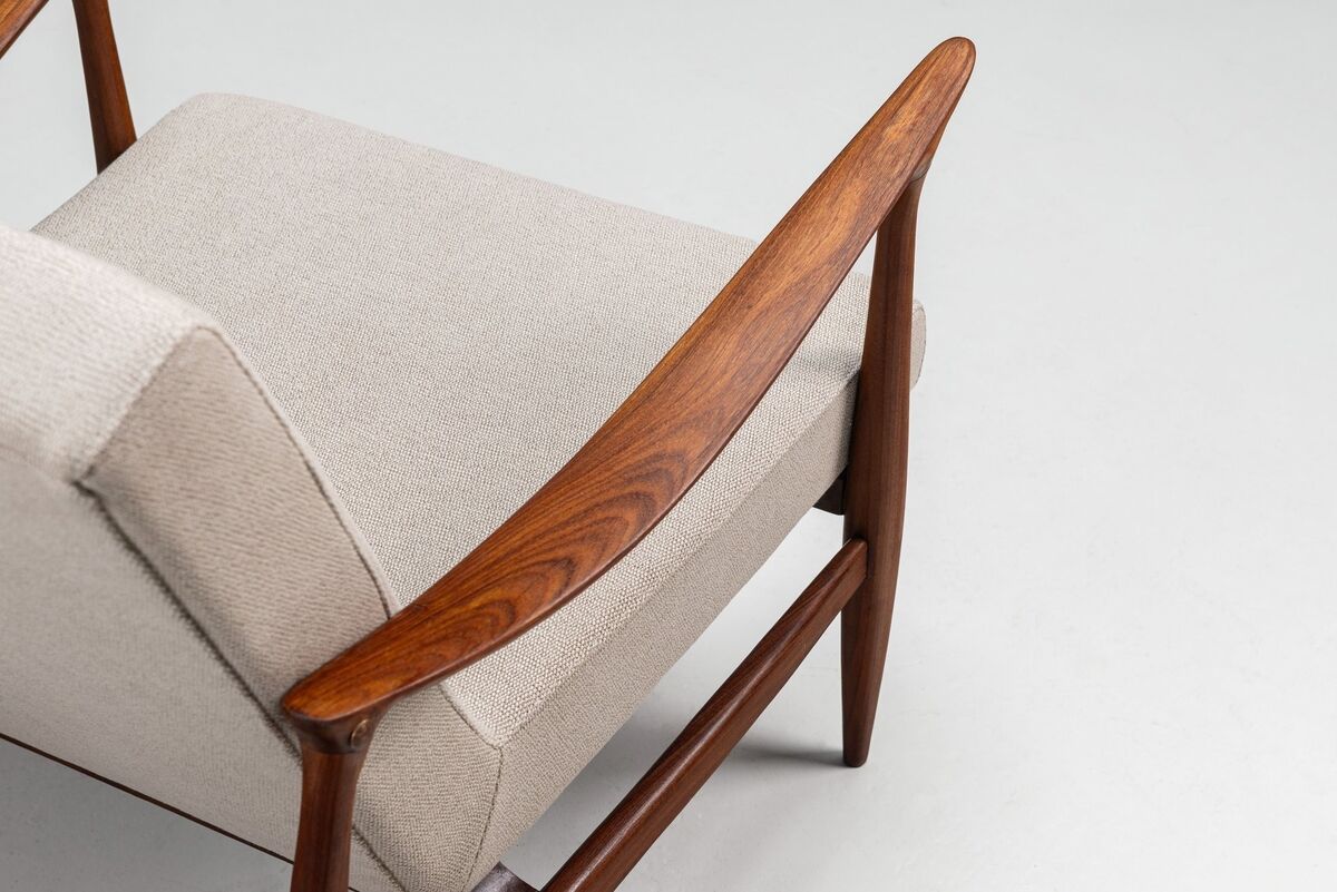 Sculptural Danish lounge chair in teak and fabric Denmark 1960