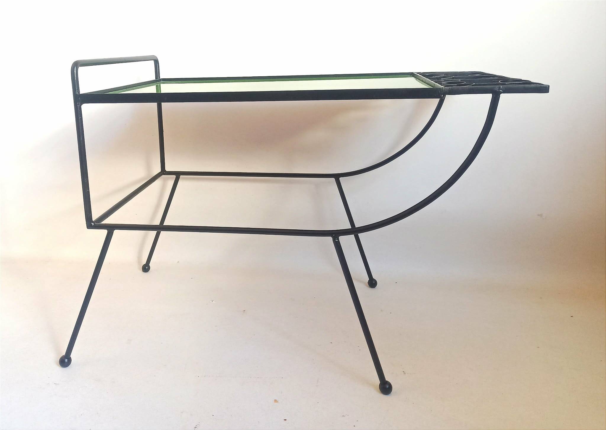 1960s side table with a lime green top, width 65.5 cm.