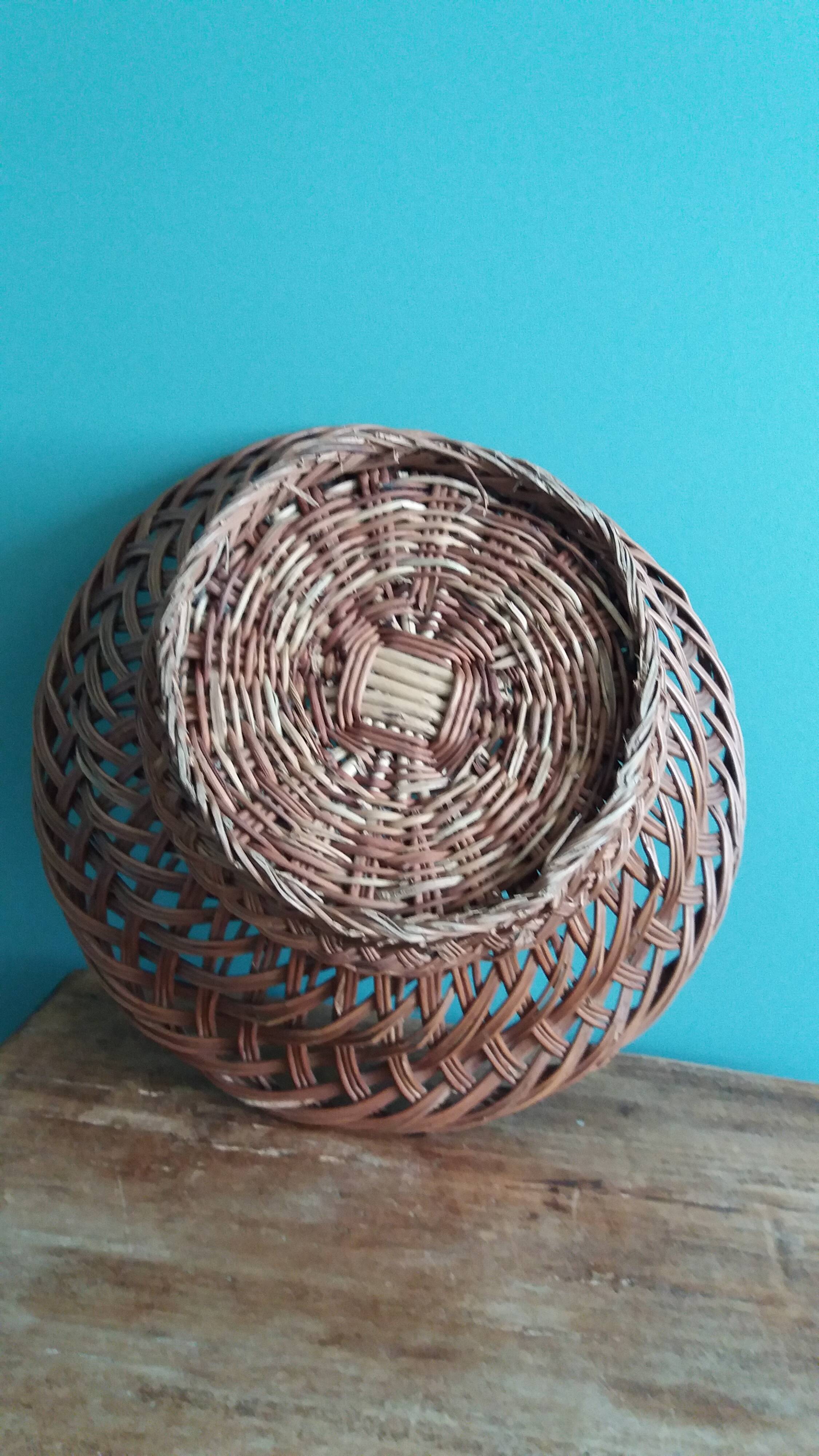 Antique basket, fruit basket or bread basket made of wicker