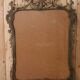 Golden wooden mirror in Louis XV style