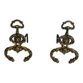 Paire de chenets de style néoclassique en bronze et fer forgé