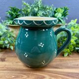 Green glazed ceramic jug
