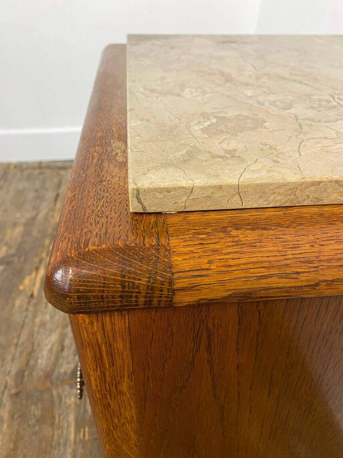 Small wooden piece of furniture with a marble top, 1950s.