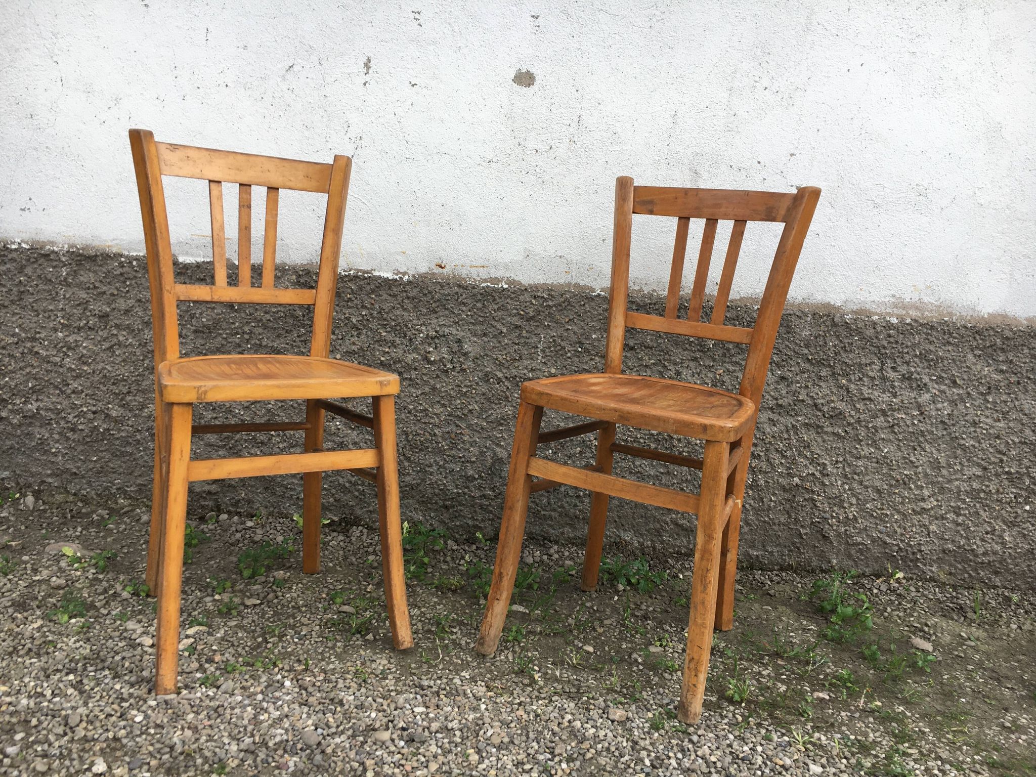 Pair of vintage curved wooden bistro chairs