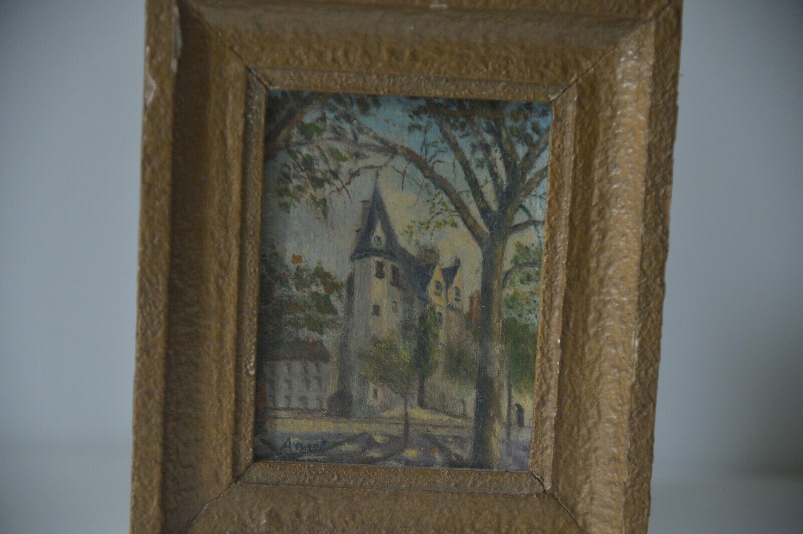 Peinture à l’huile sur panneau Château signée