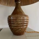 Sandstone lamp and raffia
