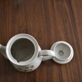 Teapot with yellow flowers