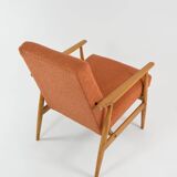 FOX terracotta curled armchair