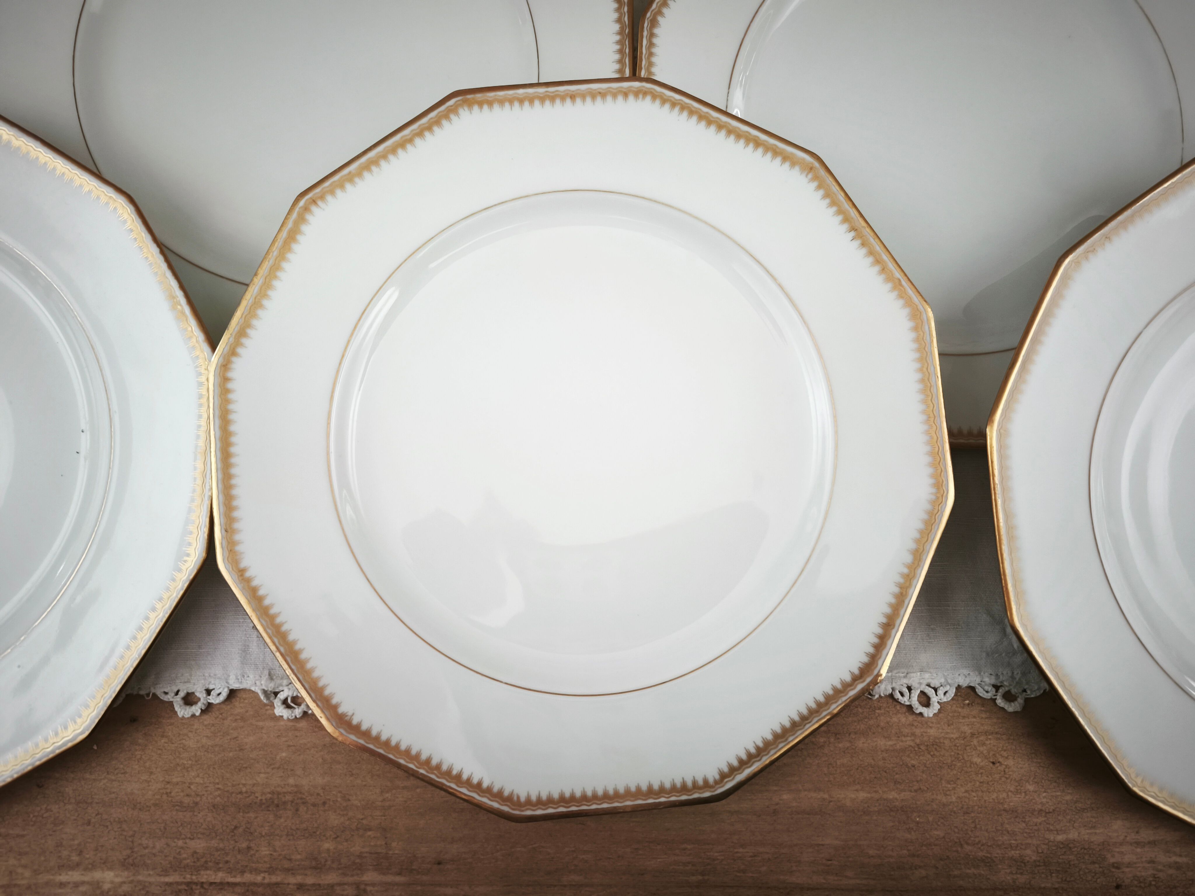 Set of 11 flat plates in Limoges porcelain by Maison Lanternier & C.