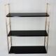 Modular string wall shelf in golden brass and black metal, 50s/60s