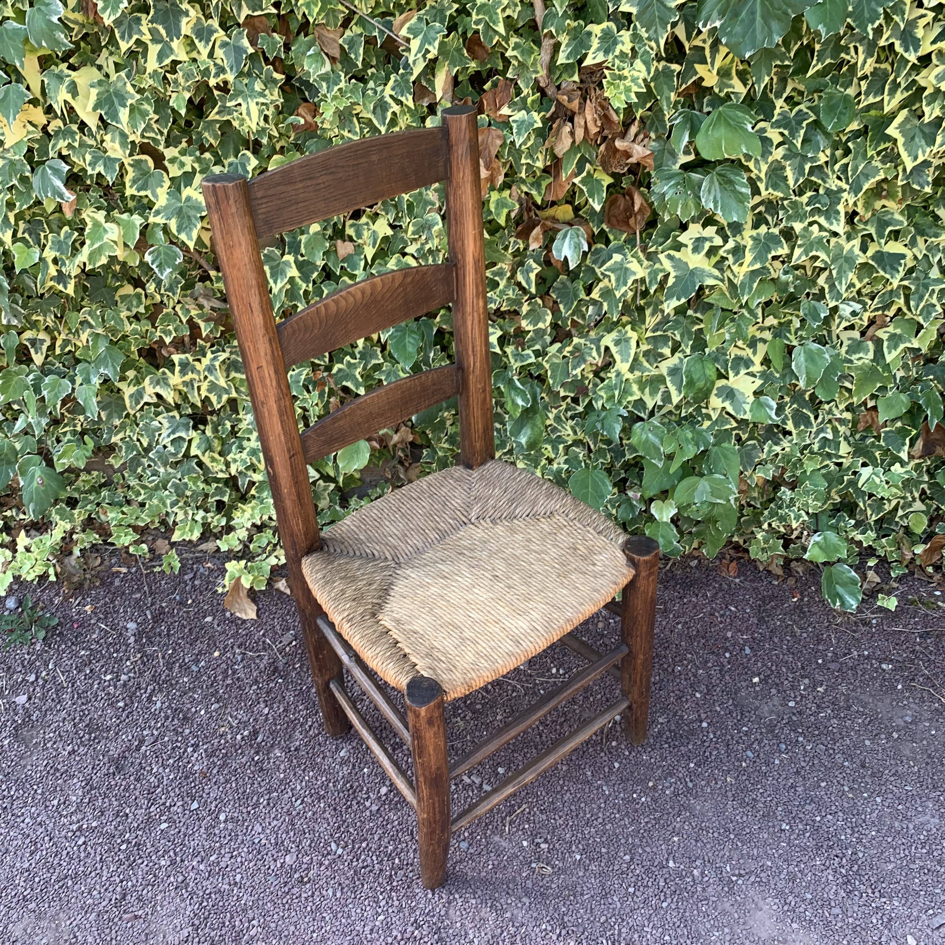 Set of 4 handcrafted rush chairs in solid oak.