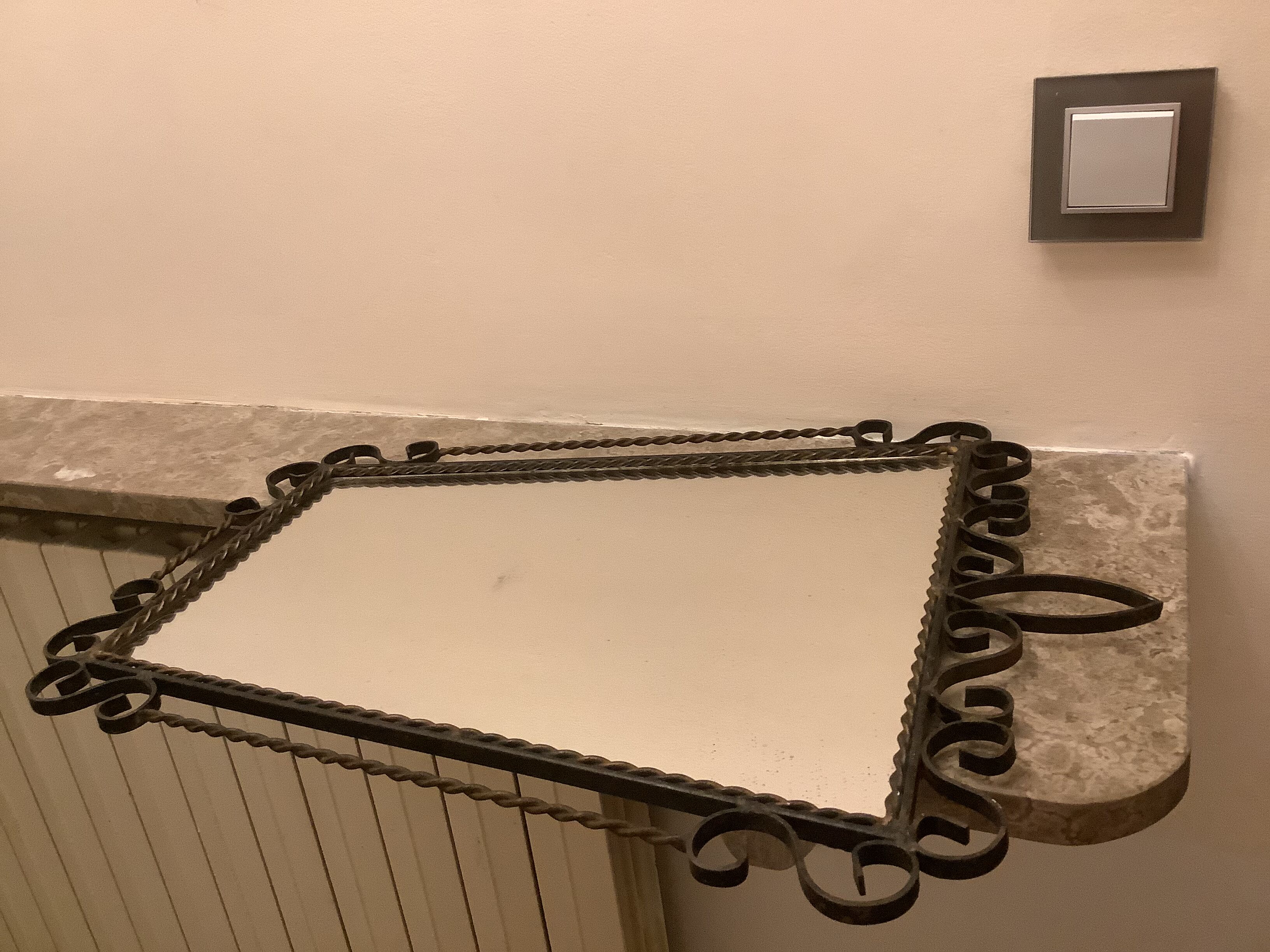 Ancient asymmetrical brutalist mirror wrought iron