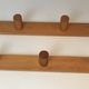 Charlotte Perriand, pair of fir wall coat racks, French work, around 1970