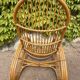Curved bamboo and rattan armchair in Italian style by Roberti from the 1960s.
