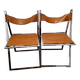 2 Chromed metal and leather folding chairs. 70s. Fontoni & Geraci
